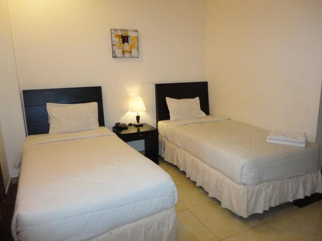 Grand Duta Hotel Palu Kamer foto