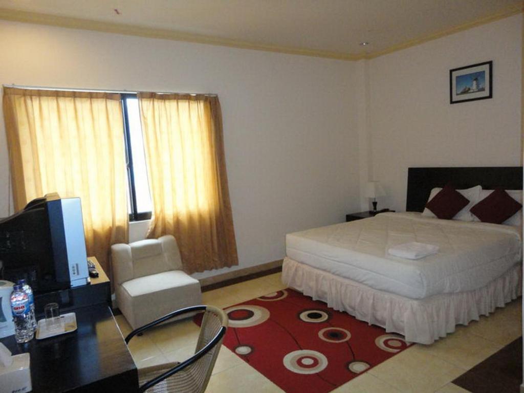 Grand Duta Hotel Palu Kamer foto