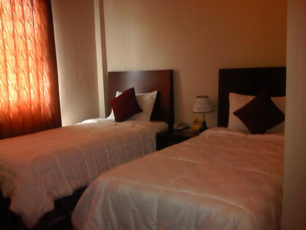 Grand Duta Hotel Palu Kamer foto